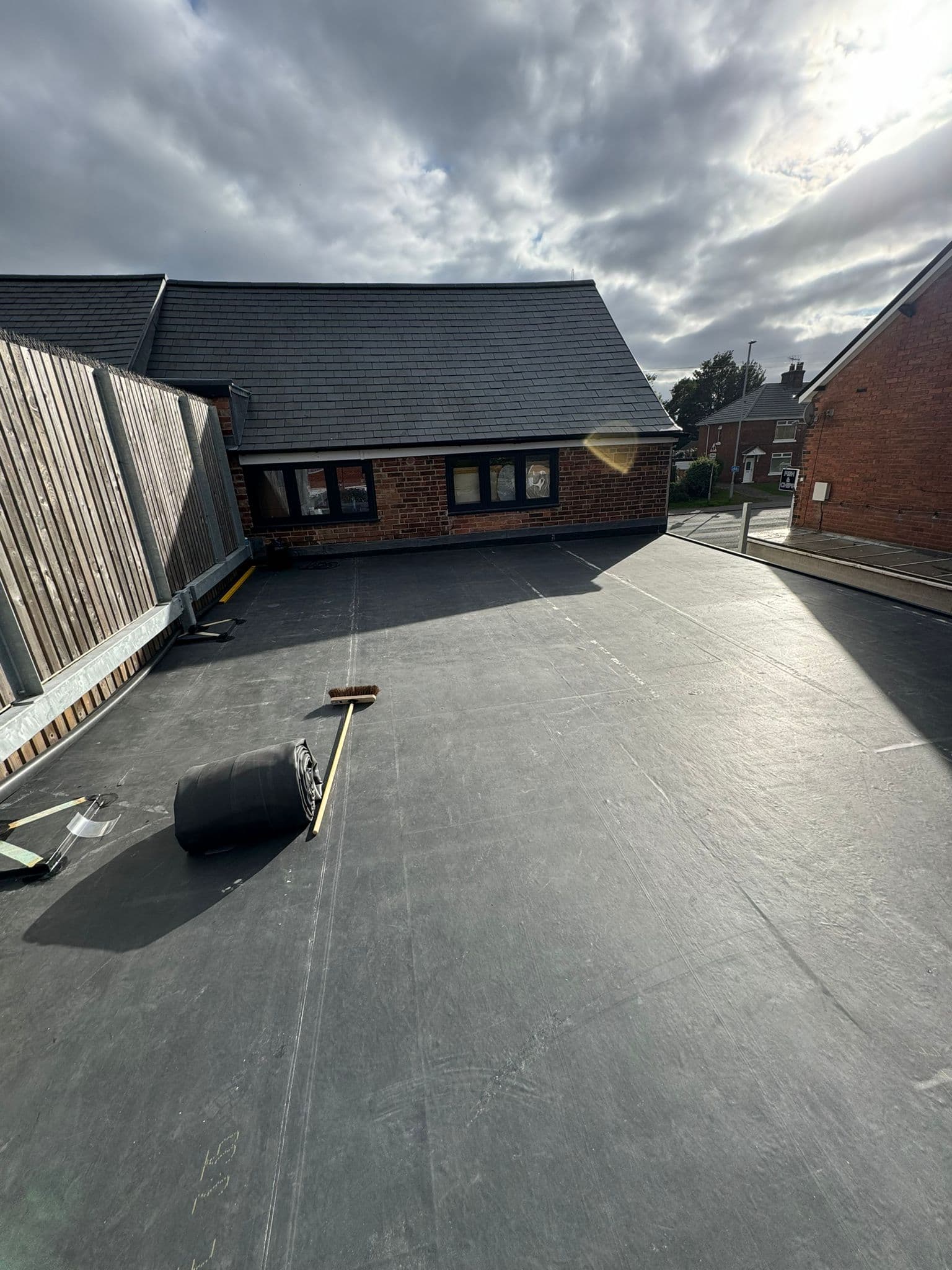 Completed Firestone EPDM rubber flat roof on a garage