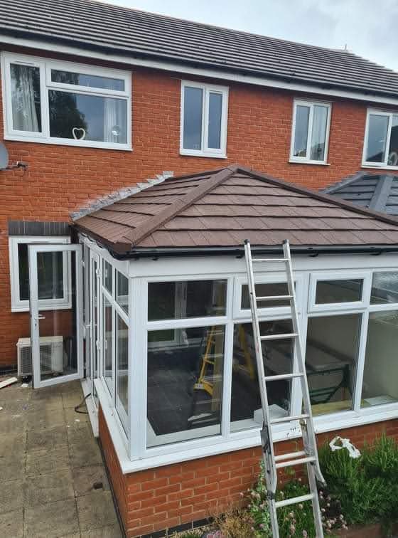 Newly fitted tiled warm roof on a conservatory